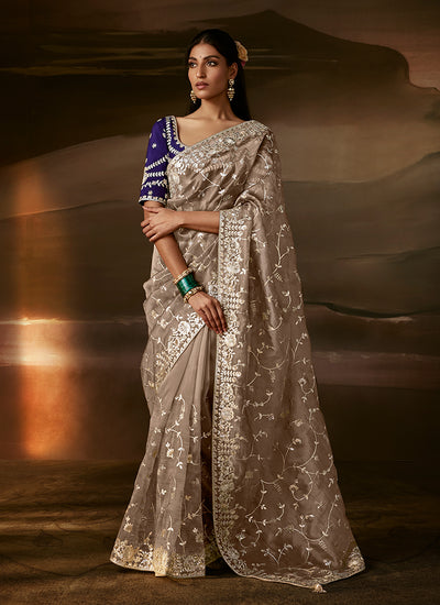 Beige And Purple Embroidered Organza Silk Saree