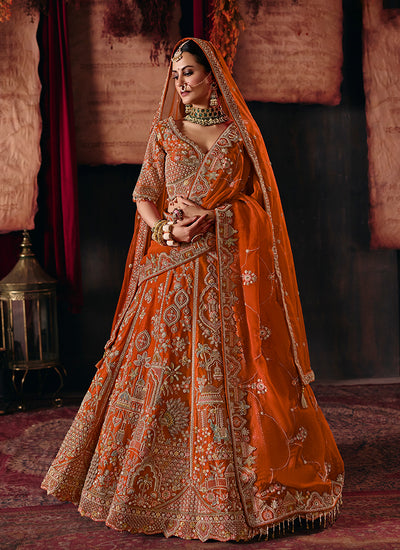 Rust Orange Embroidered Silk Lehenga Choli And Dupatta