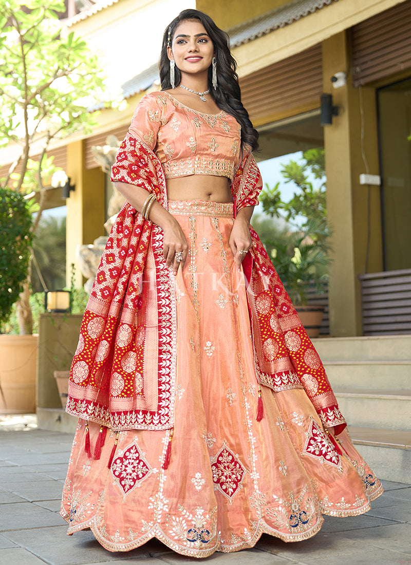 Peach And Red Lehenga Choli