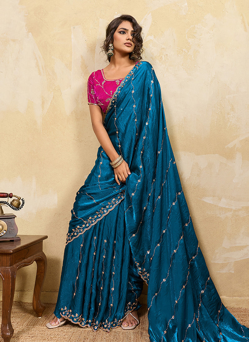 Turquoise and Pink Embroidered Satin Saree