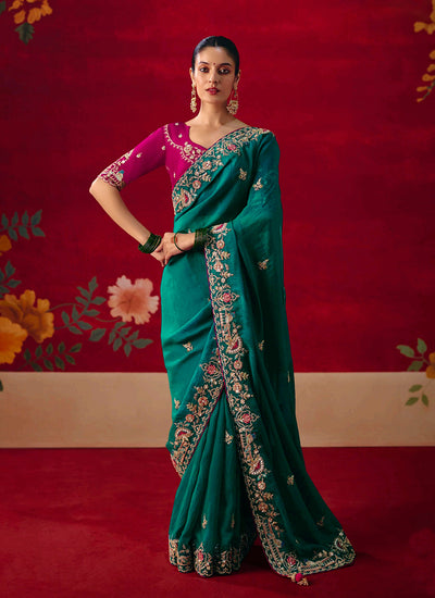 Turquoise Embroidered Saree with Magenta Blouse