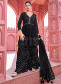 Indian Dresses - Black Sequence Embroidery Peplum Style Sharara Suit At Hatkay Buy Latest Indian Outfits With Free Shipping.