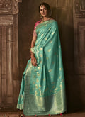 Teal And Pink Weaved Pure Dola Silk Saree