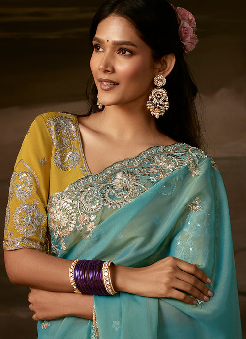 Aqua Blue And Yellow Embroidered Organza Silk Saree