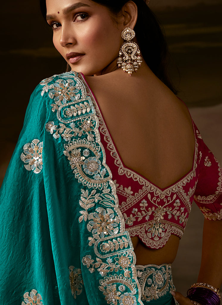 Turquoise And Magenta Embroidered Organza Silk Saree