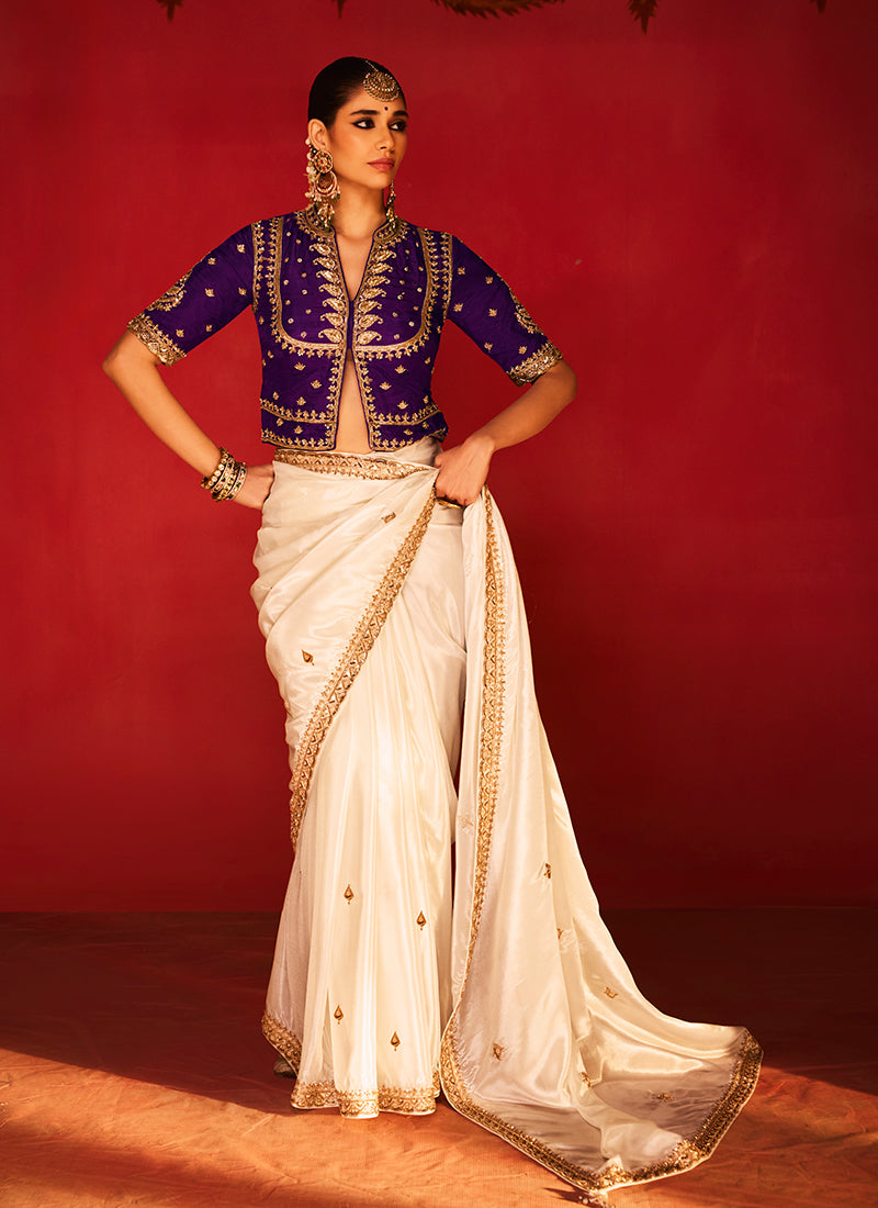 Off White and Purple Saree with Handworked Blouse