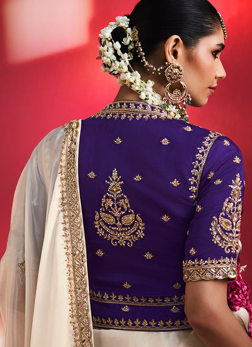 Off White and Purple Saree with Handworked Blouse