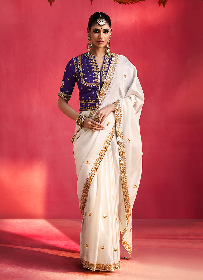 Off White and Purple Saree with Handworked Blouse