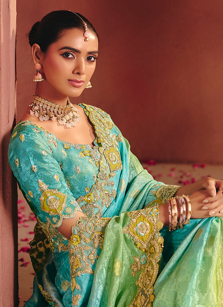 Turquoise and Green Multi Embroidery Wedding Silk Saree