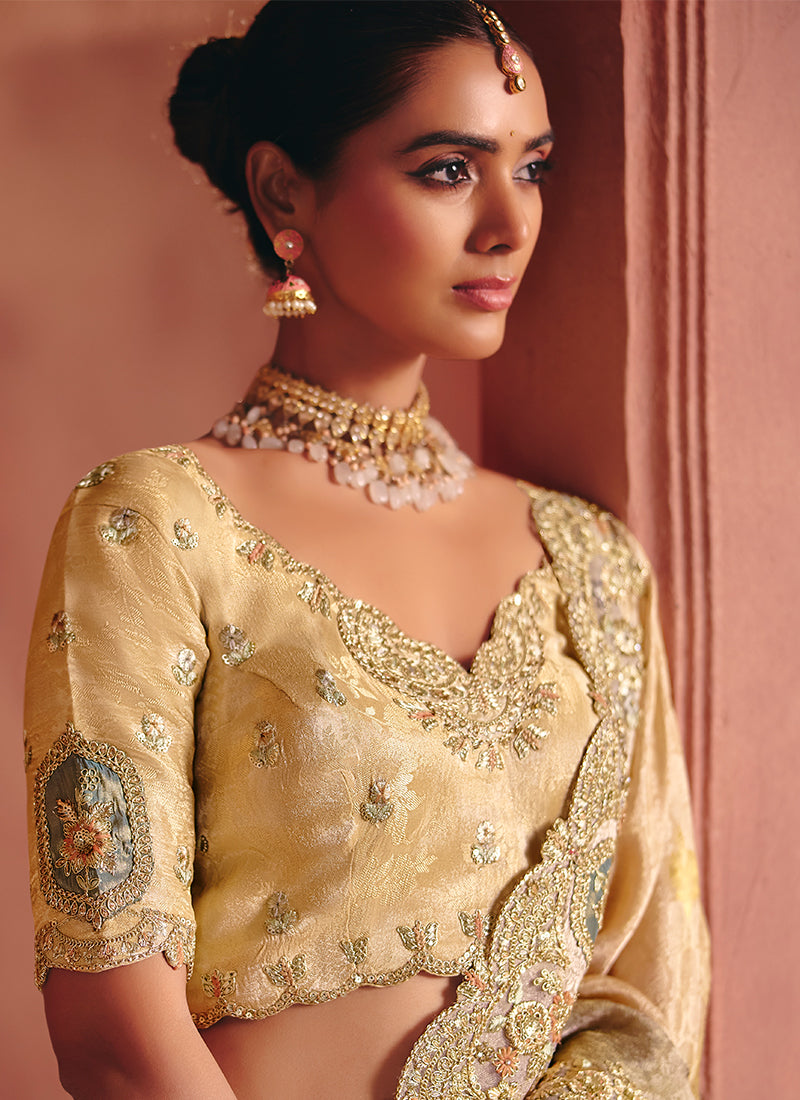 Cream and Firozi Multi Embroidery Wedding Silk Saree