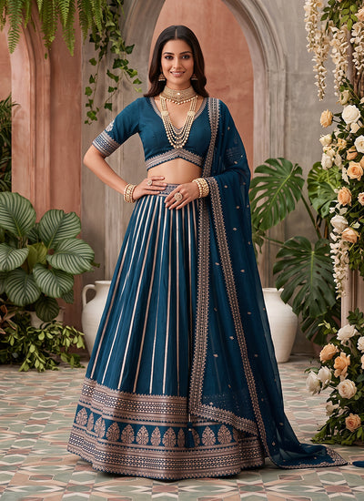 Teal Blue Reshamkari Embroidery Silk Lehenga Choli