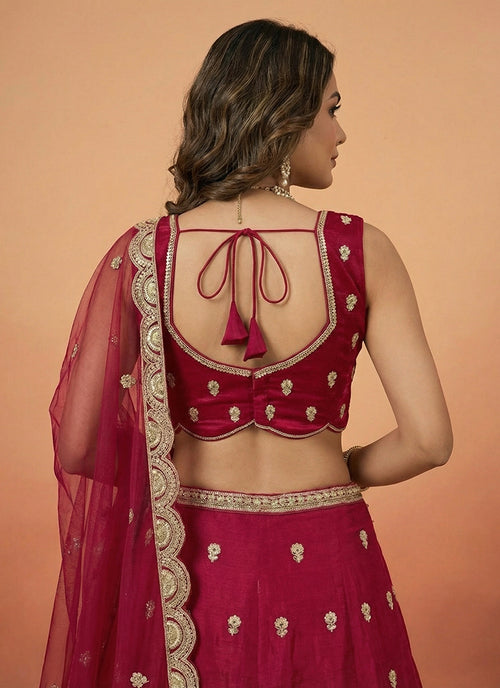 Magenta Pink Embroidered Wedding Lehenga Choli for bridal wear.
