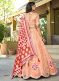 Peach And Red Wedding Lehenga Choli