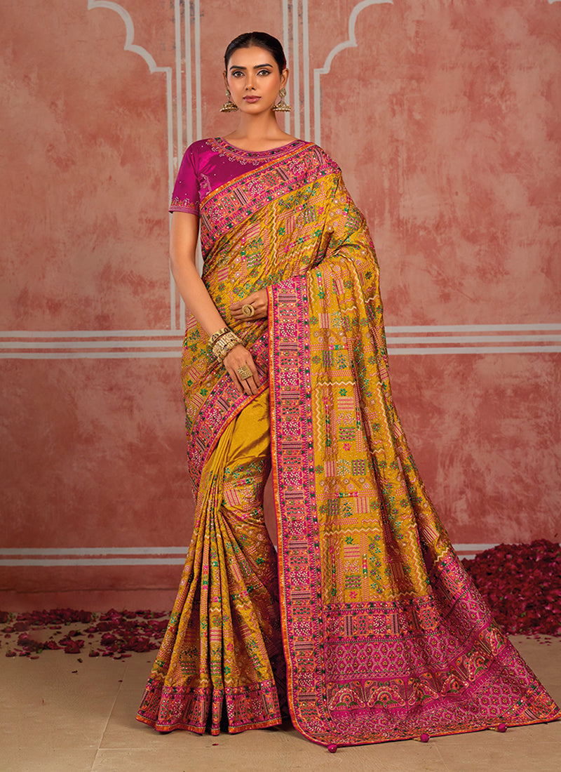 Mustard And Pink Kutchi Embroidered Pure Silk Saree
