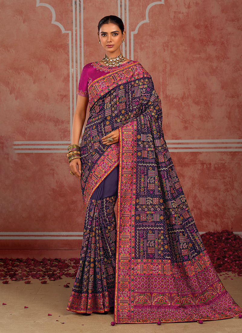 Purple And Pink Kutchi Embroidered Pure Silk Saree