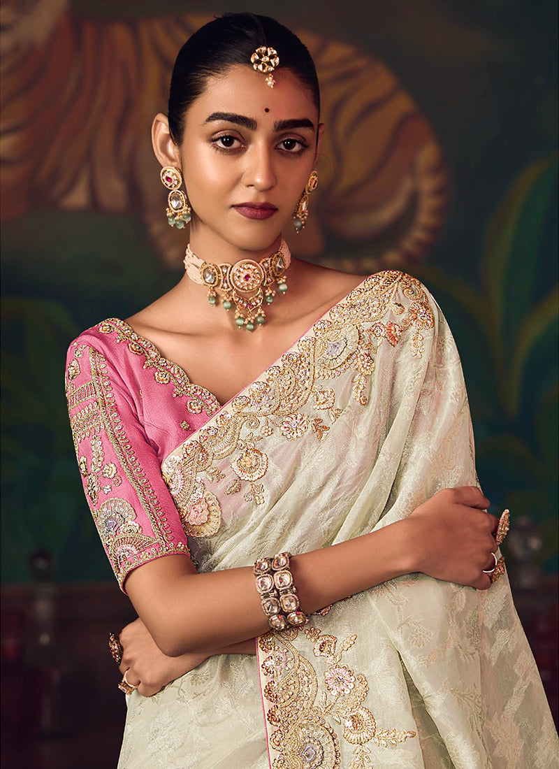 Cream And Pink Embroidered Fancy Silk Saree