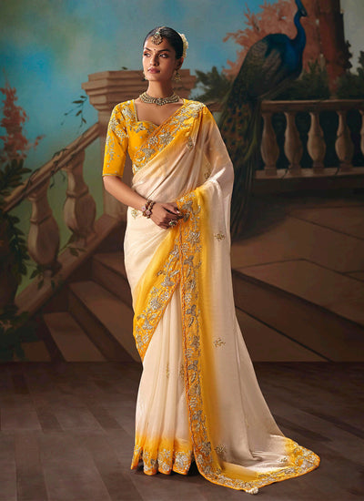 Cream and Yellow Embroidered Party Wear Silk Saree