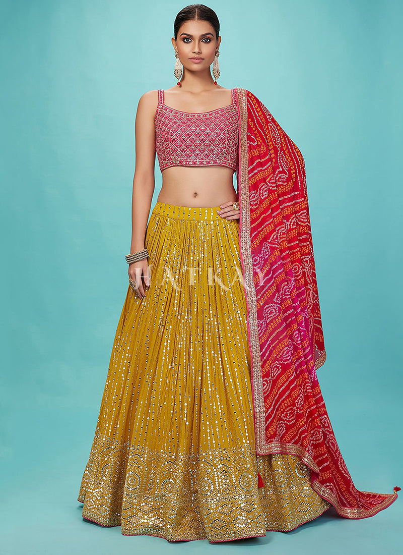 Yellow And Magenta Embroidered Lehenga Choli