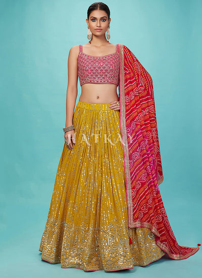 Yellow And Magenta Embroidered Lehenga Choli