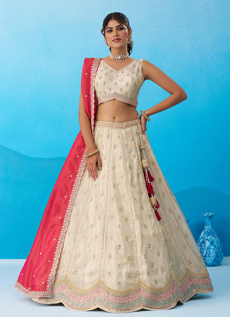 Cream And Pink Embroidered Tissue Silk Wedding Lehenga Choli