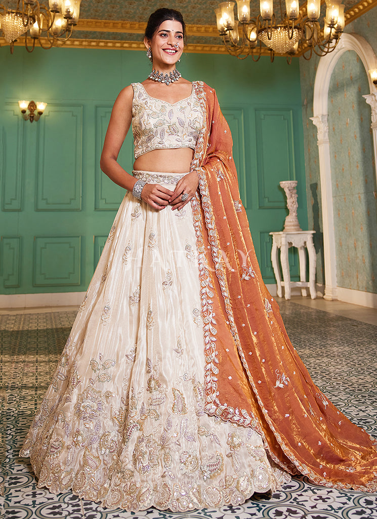 Off White And Orange Embroidered Bridal Lehenga Choli