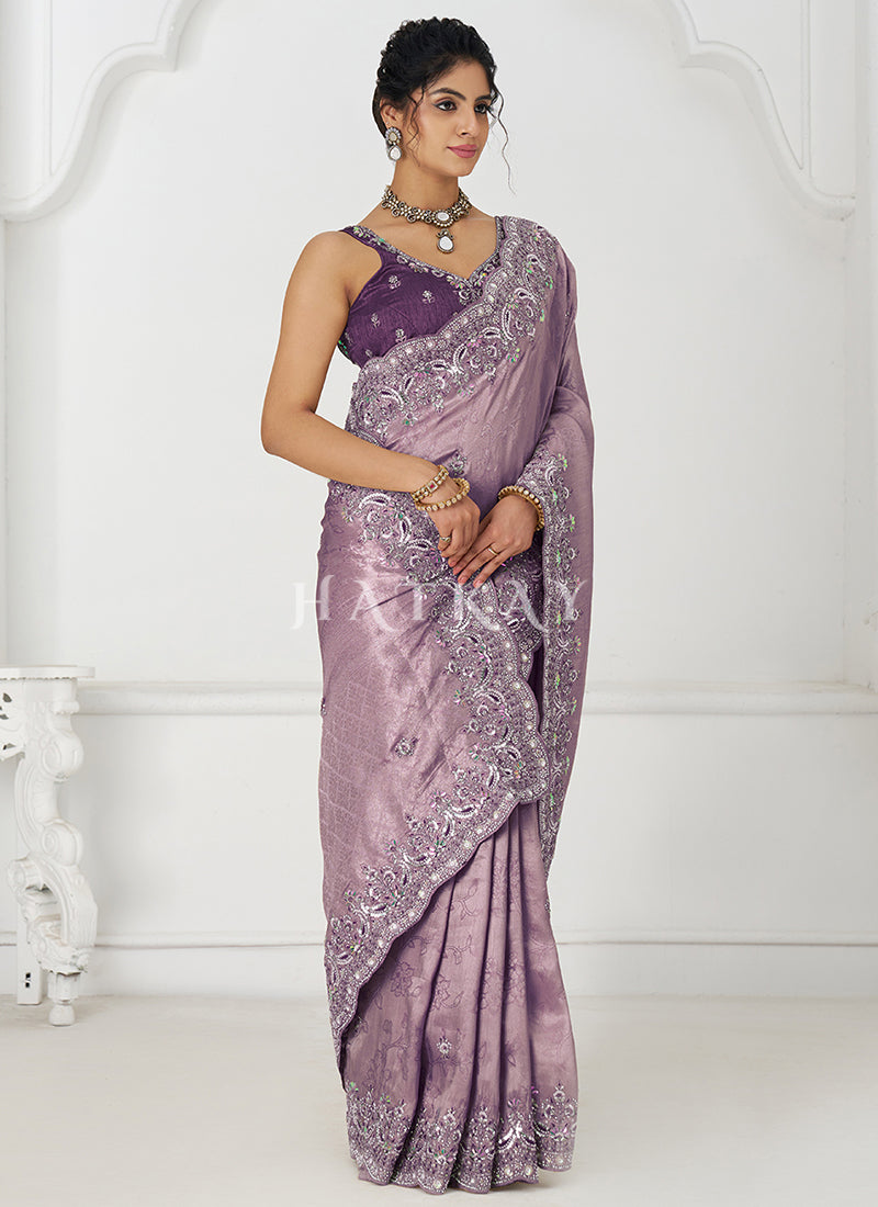 Stay stylish and trendy with a variety of wedding wear saree options at the best price.
