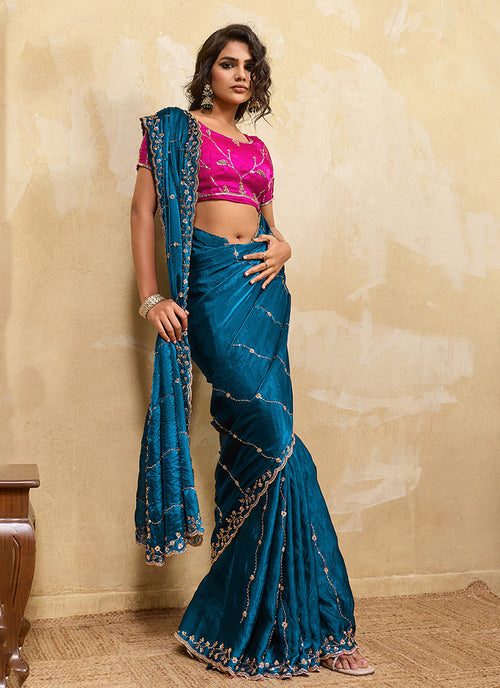 Turquoise and Pink Embroidered Satin Saree