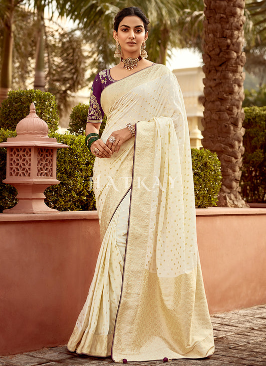 Off White And Purple Embroidered Wedding Silk Saree