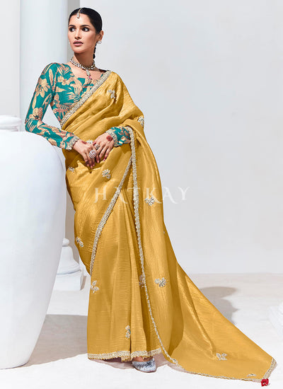 Yellow And Turquoise Embroidered Organza Silk Saree