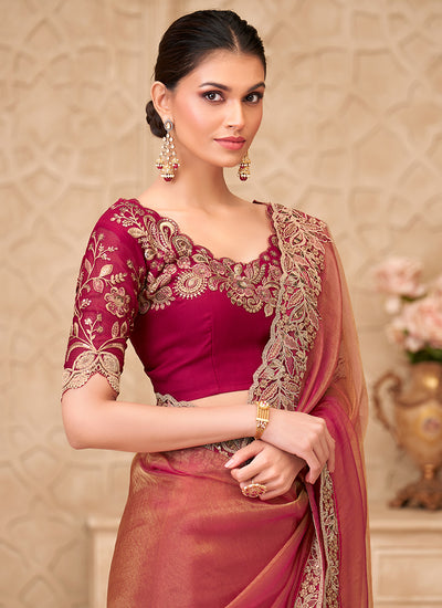Pinkish Orange Embroidered Georgette Saree