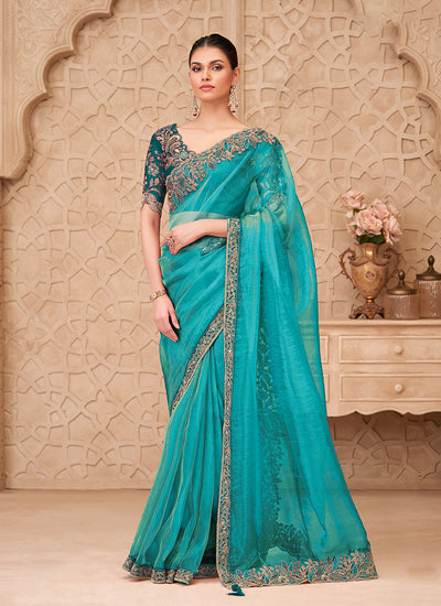 Turquoise Embroidered Georgette Saree