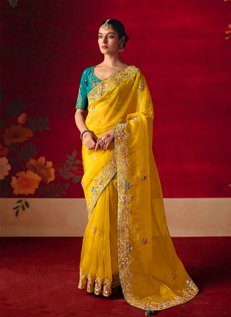 Yellow Embroidered Saree with Teal Blouse
