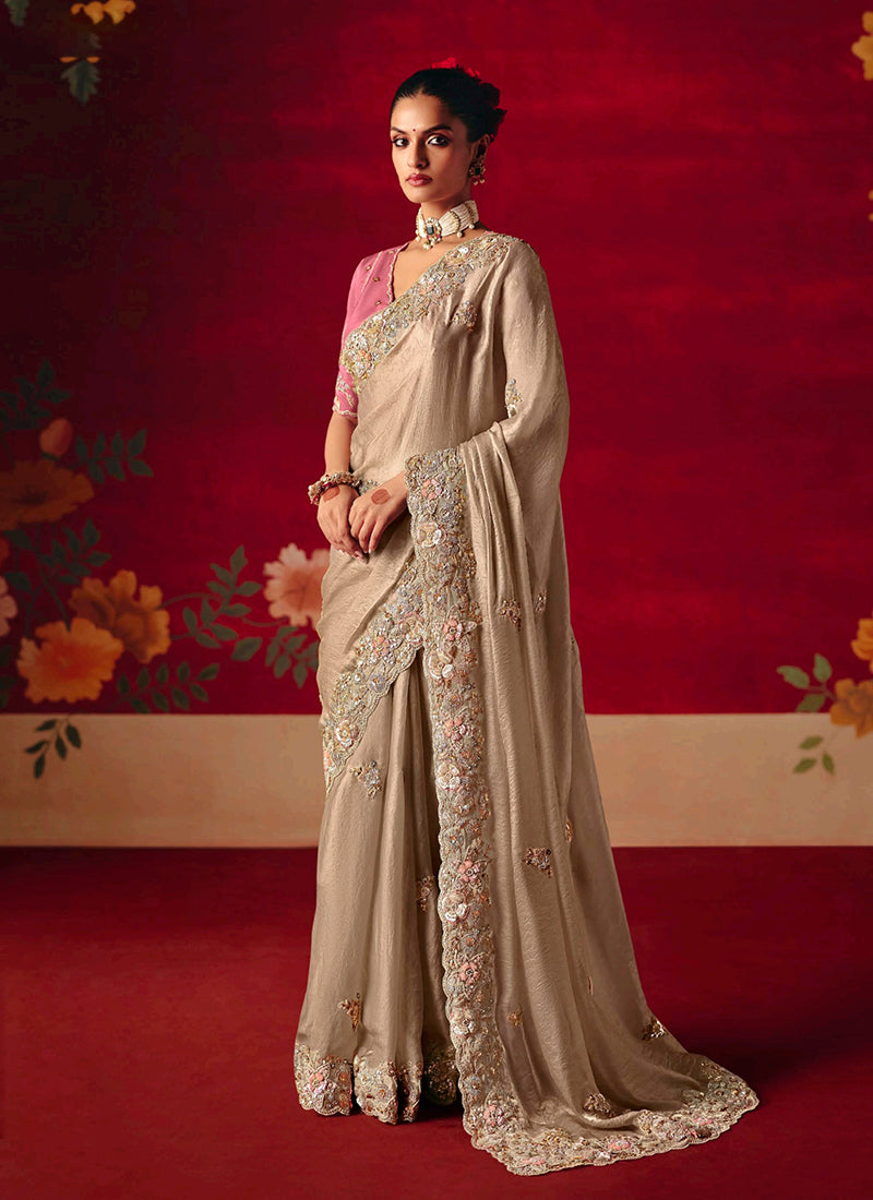 Beige Embroidered Saree with Pink Blouse