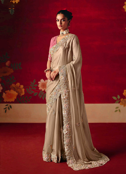Beige Embroidered Saree with Pink Blouse