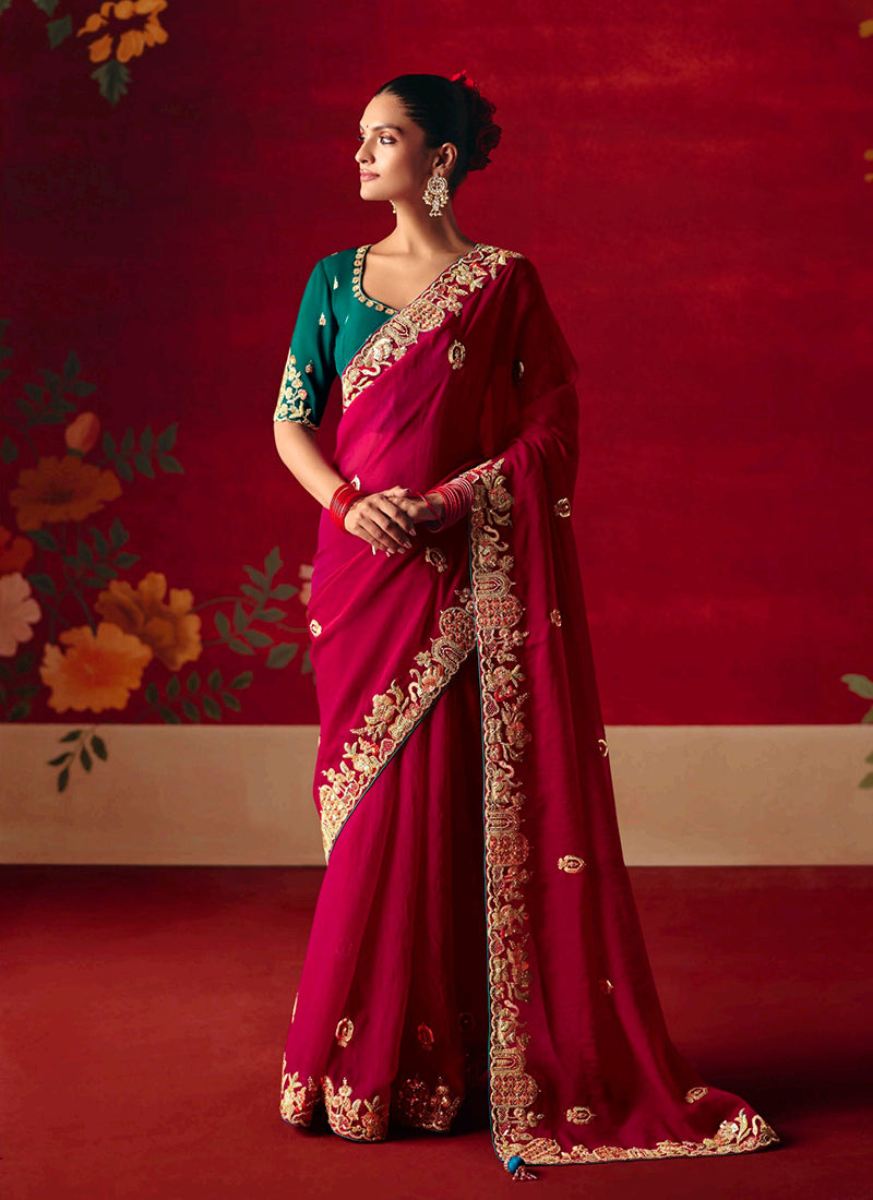 Red Embroidered Saree with Turquoise Blouse