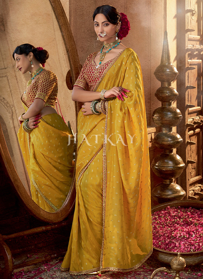Yellow And Red Embroidered Viscose Saree