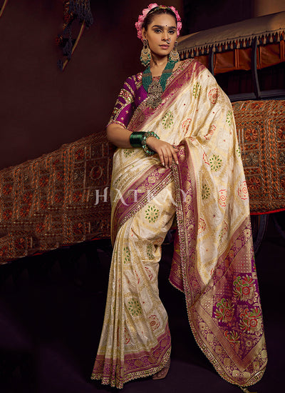 Cream And Purple Embroidered Silk Saree