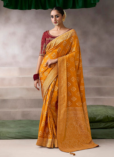 Yellow and Red Embroidery Crepe Silk Saree