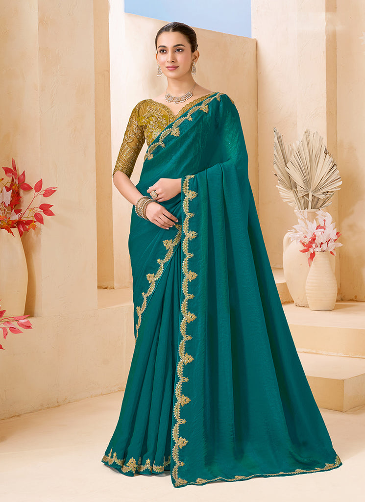 Teal And Mustard Embroidered Georgette Saree