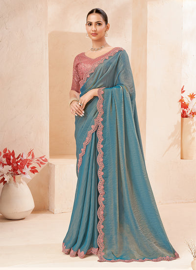 Aqua Blue And Pink Embroidered Georgette Saree