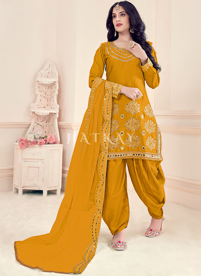 Salwar Suits : Yellow velvet embroidered salwar suit