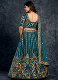 Turquoise Multi Embroidery Silk Wedding Lehenga Choli