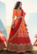 Orange And Red Embroidered Wedding Lehenga Choli