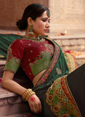 Green And Maroon Zari Embroidered Saree